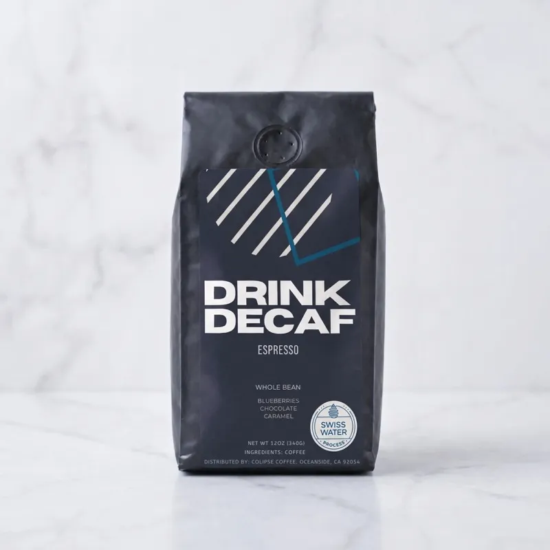 Drink Decaf Espresso bag on marble — specialty grade decaf